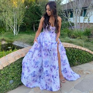 Strapless maxi dress with a delicate floral print.
